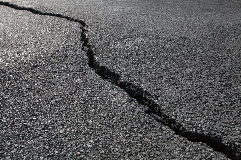 How Weather Conditions Affect Asphalt Cracks And Potholes
